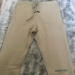 Men’s ESSENTIALS sweatpants in Tan. Size XL.